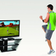 A promo image of EA's Sports Active 2, in which a man jogs in front of a TV showing a man jogging.